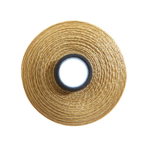 Close-up of a Glide 40 weight polyester thread bobbin in Cleopatra, size M, with 132 yards of thread.