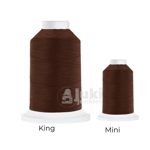 Close-up of two Cairo Quilt 50 weight Egyptian cotton thread spools in Dark Brown, showing a soft, matte finish. A large King spool (3,000 yards) and a smaller Mini spool (670 yards) are side by side for size comparison.