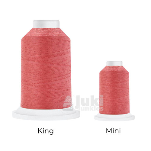Close-up of two Cairo Quilt 50 weight Egyptian cotton thread spools in Peppermint, showing a soft, matte finish. A large King spool (3,000 yards) and a smaller Mini spool (670 yards) are side by side for size comparison.