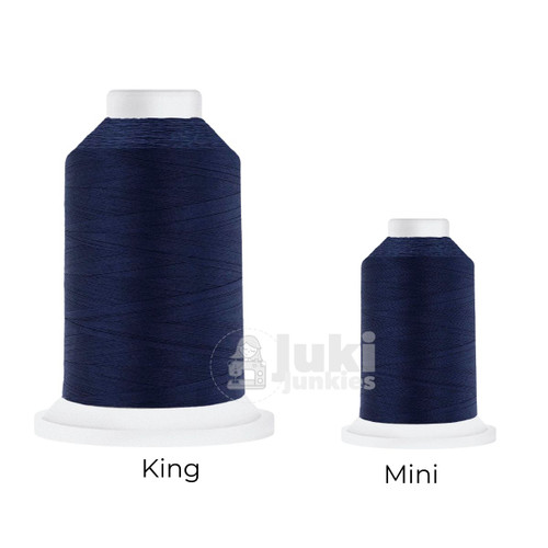 Close-up of two Cairo Quilt 50 weight Egyptian cotton thread spools in Blueberry, showing a soft, matte finish. A large King spool (3,000 yards) and a smaller Mini spool (670 yards) are side by side for size comparison.