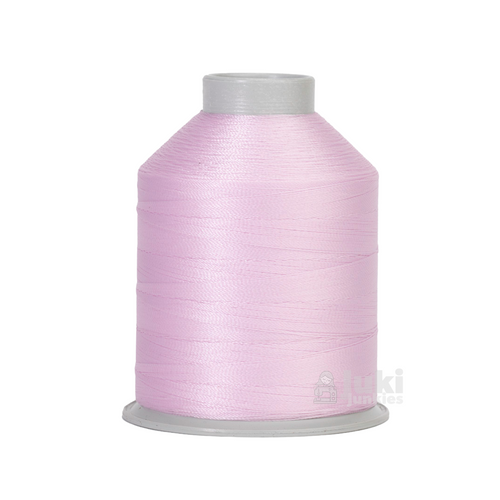 Close-up of a 2,175-yard spool of bonded nylon Tex 45 thread in Bubble Gum, showing its smooth, glossy finish.