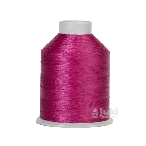 Close-up of a 2,175-yard spool of bonded nylon Tex 45 thread in Plum, showing its smooth, glossy finish.