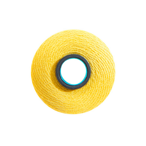 Close-up of a Magna-Quilt 50 weight cotton bobbin, size L, in Bright Yellow, with 74 yards of thread.