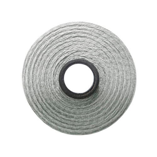 Close-up of a Magna-Quilt 50 weight cotton bobbin, size M, in Light Grey, with 132 yards of thread.
