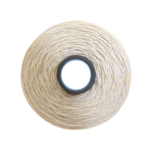 Close-up of a Magna-Quilt 50 weight cotton bobbin, size M, in Cream, with 132 yards of thread.