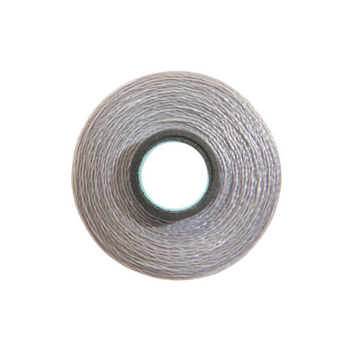 Close-up of a Glide 60 weight polyester bobbin in Light Grey, size L, with 130 yards of fine thread.