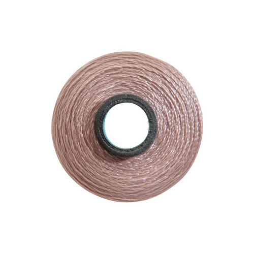 Close-up of a Glide 60 weight polyester bobbin in Tuscan, size L, with 130 yards of fine thread.