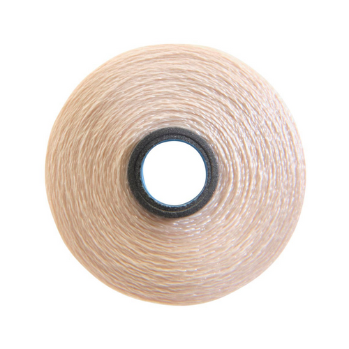 Close-up of a Glide 60 weight polyester bobbin in Cream, size M, with 210 yards of fine thread.