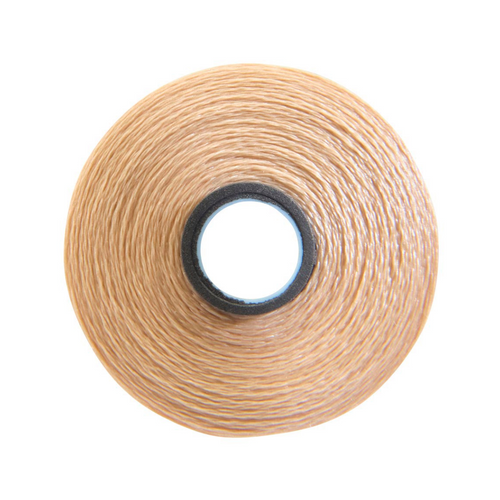 Close-up of a Glide 60 weight polyester bobbin in Light Tan, size M, with 210 yards of fine thread.