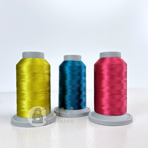 Shades of Split Pea, Pomegranate, Cosmic in Glide 40wt. mini spools of 1100yd spools