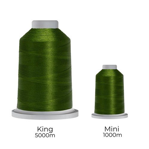 Close-up of two spools of Glide 40 weight polyester thread in Leaf: a large King spool (5,500 yards) and a smaller Mini spool (1,100 yards), shown side by side for size comparison, with a smooth texture and noticeable sheen.