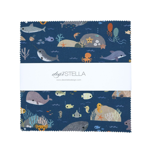 Close up of 10inch by 10inch fabric precut squares of the Beyond the Sea fabric collection