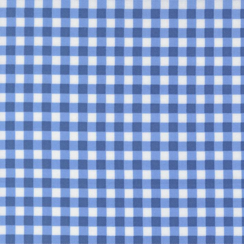 Close up of fabric with a cobalt gingham pattern on a white background