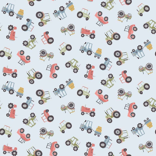 Close up of fabric with red, green, and blue tractors that have attached hay bales on a light blue background
