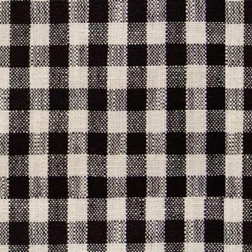 Close up of towel fabric with a white and black colored gingham pattern