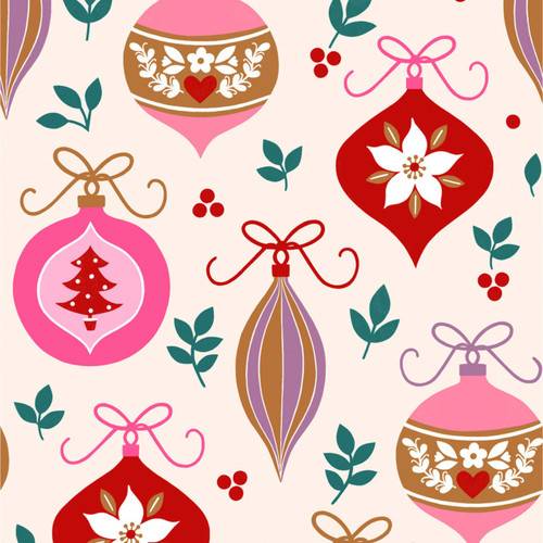 Close up of fabric with various Christmas tree ornaments on a cream background
