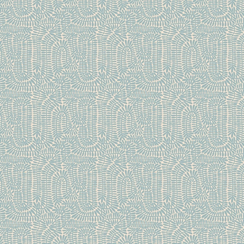 Close up of fabric with an abstract leaf pattern in light blue on a cream colored background