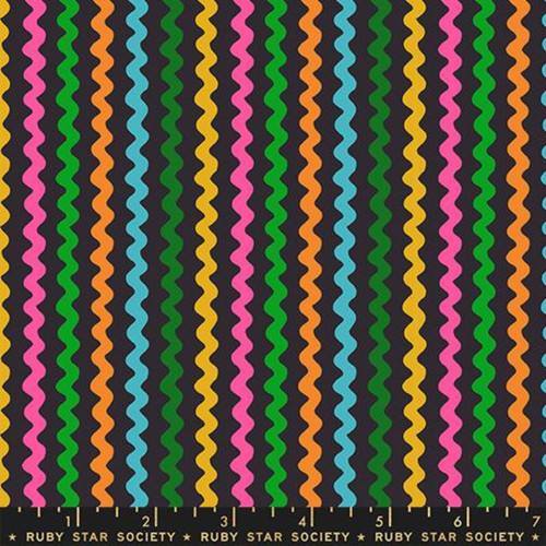 7inch by 7inch of fabric with vertical chevron stripes in rainbow colors on a beige background