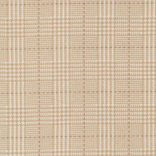 Close up of fabric with a plaid print in cream