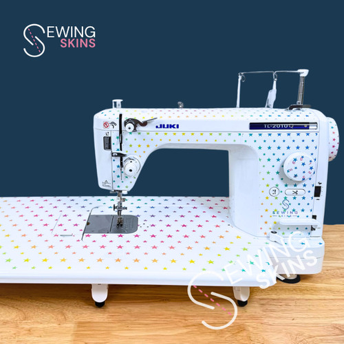 SEWING MACHINE DECAL WITH RAINBOW STARS COVERING A JUKI TL MODEL