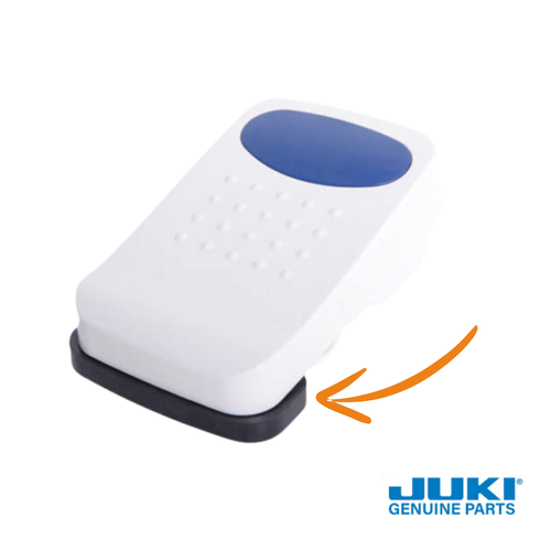 TL Foot Switch Stopper installed on the foot controller, disabling the heel-activated auto thread cutter function.  Part no 401653581