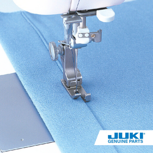 Right compensating 1.5 millimeter foot on a TL high shank machine stitching 1.5 millimeters from a thick seam with the spring-loaded guide for stable stitching on light to heavy fabric