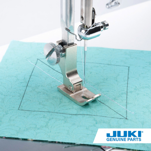 Juki hinged 7mm foot on a TL high shank machine, piecing with a 7mm seam allowance common in European patterns, versatile for thick fabrics