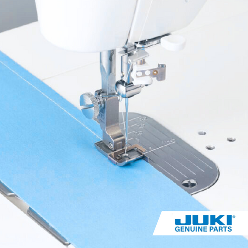 Juki one-quarter inch presser foot with guide on a TL high shank machine, piecing cotton material with a consistent 6.5 millimeter seam allowance, ideal for straight or curved stitching