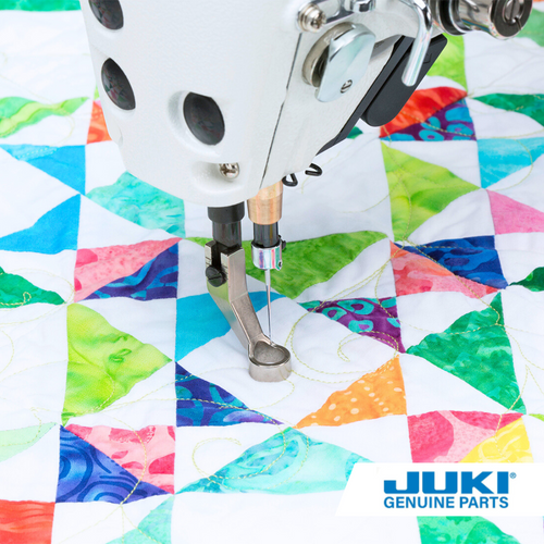 Juki one-quarter inch ruler foot on a longarm machine, designed for free-motion quilting and ruler work with a one-quarter inch spacing from the needle to the outer edge