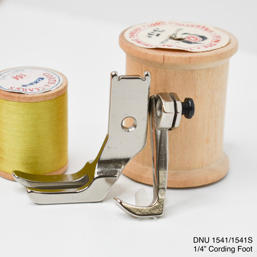 One-quarter inch cording, welting, and piping presser foot for Juki DNU-1541, designed for applying covered welt cord or piping with precision on Juki industrial walking foot machines.