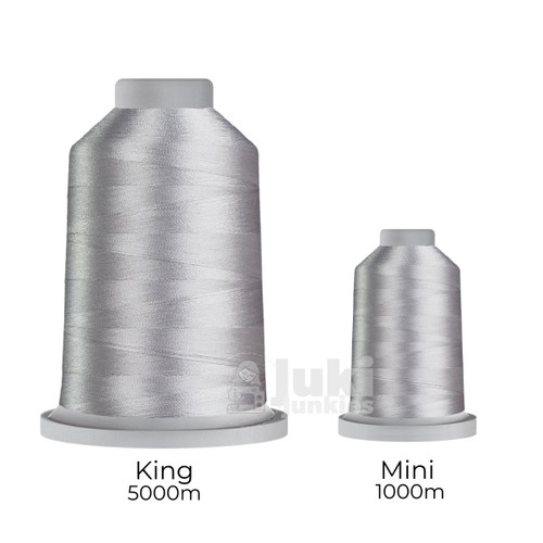 Close-up of two spools of Glide 40 weight polyester thread in Smoke: a large King spool (5,500 yards) and a smaller Mini spool (1,100 yards), shown side by side for size comparison, with a smooth texture and noticeable sheen.