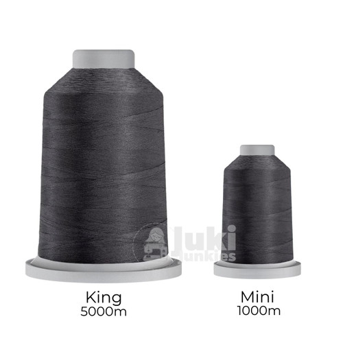 Close-up of two spools of Glide 40 weight polyester thread in Slate: a large King spool (5,500 yards) and a smaller Mini spool (1,100 yards), shown side by side for size comparison, with a smooth texture and noticeable sheen.