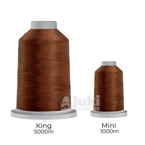Close-up of two spools of Glide 40 weight polyester thread in Medium Brown: a large King spool (5,500 yards) and a smaller Mini spool (1,100 yards), shown side by side for size comparison, with a smooth texture and noticeable sheen.