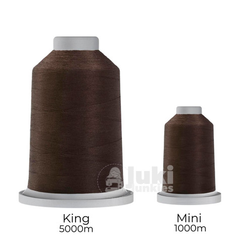 Close-up of two spools of Glide 40 weight polyester thread in Brownie: a large King spool (5,500 yards) and a smaller Mini spool (1,100 yards), shown side by side for size comparison, with a smooth texture and noticeable sheen.