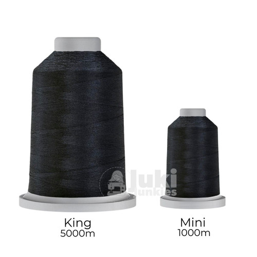 Close-up of two spools of Glide 40 weight polyester thread in Rock Navy: a large King spool (5,500 yards) and a smaller Mini spool (1,100 yards), shown side by side for size comparison, with a smooth texture and noticeable sheen.
