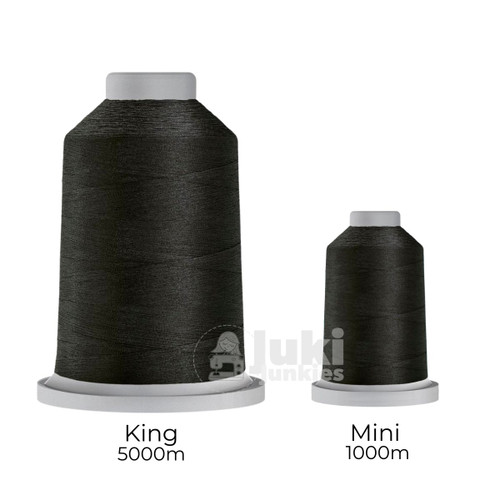 Close-up of two spools of Glide 40 weight polyester thread in Eclipse: a large King spool (5,500 yards) and a smaller Mini spool (1,100 yards), shown side by side for size comparison, with a smooth texture and noticeable sheen.