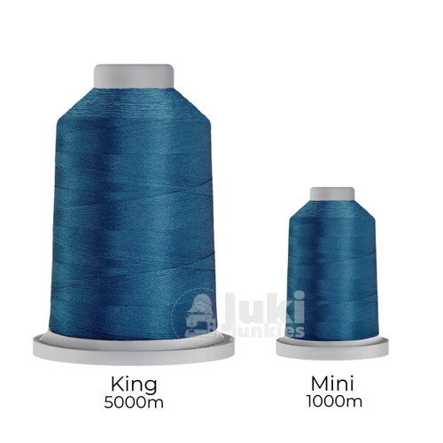 Close-up of two spools of Glide 40 weight polyester thread in Air Force Blue: a large King spool (5,500 yards) and a smaller Mini spool (1,100 yards), shown side by side for size comparison, with a smooth texture and noticeable sheen.