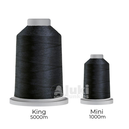 Close-up of two spools of Glide 40 weight polyester thread in Navy: a large King spool (5,500 yards) and a smaller Mini spool (1,100 yards), shown side by side for size comparison, with a smooth texture and noticeable sheen.