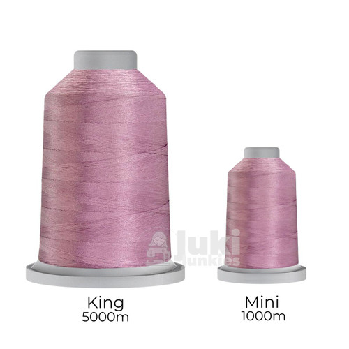 Close-up of two spools of Glide 40 weight polyester thread in Tabriz Orchid: a large King spool (5,500 yards) and a smaller Mini spool (1,100 yards), shown side by side for size comparison, with a smooth texture and noticeable sheen.