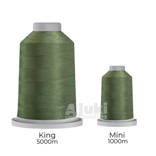 Close-up of two spools of Glide 40 weight polyester thread in Thyme: a large King spool (5,500 yards) and a smaller Mini spool (1,100 yards), shown side by side for size comparison, with a smooth texture and noticeable sheen.