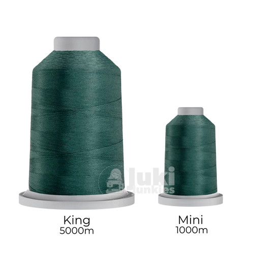 Close-up of two spools of Glide 40 weight polyester thread in Persian: large King spool (5,500 yards) and a smaller Mini spool (1,100 yards), shown side by side for size comparison, with a smooth texture and noticeable sheen.