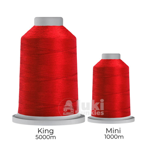 Close-up of two spools of Glide 40 weight polyester thread in Jamaica Sun: a large King spool (5,500 yards) and a smaller Mini spool (1,100 yards), shown side by side for size comparison, with a smooth texture and noticeable sheen.