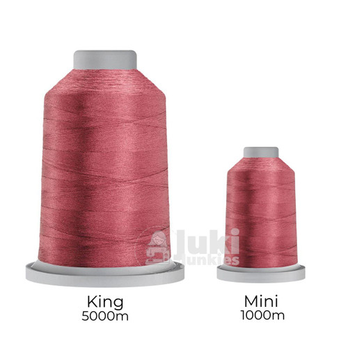 Close-up of two spools of Glide 40 weight polyester thread in Purple Rose: a large King spool (5,500 yards) and a smaller Mini spool (1,100 yards), shown side by side for size comparison, with a smooth texture and noticeable sheen.
