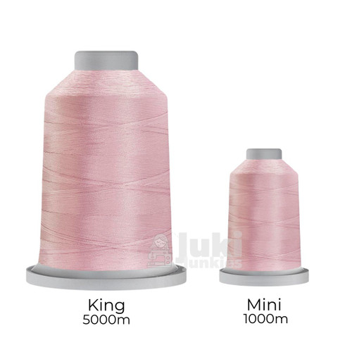 Close-up of two spools of Glide 40 weight polyester thread in Peacock: a large King spool (5,500 yards) and a smaller Mini spool (1,100 yards), shown side by side for size comparison, with a smooth texture and noticeable sheen.