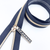Sparkle #5 Sewcioath zipper pull is gold installed on a navy and gold #5 zipper tape