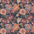 Close up of fabric with bright colored florals on a dark navy background