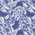 Close up of fabric with a white leafy pattern on a blue background