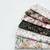 6 fabric swatches laid on top of each other