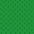 Close up of fabric with green holiday bells on a green background with green polka dots
