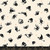 7inch by 7inch of fabric with black spiders and small orange spiders on a cream colored background